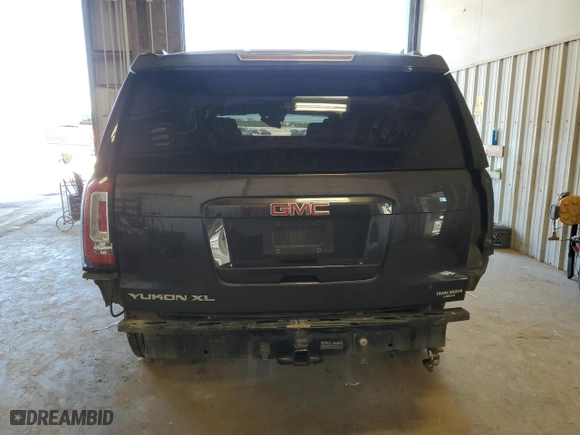 2017 GMC Yukon XL SLT with VIN 1GKS1GKC1HR390673, listed as a Copart auction lot 79182304 with 165,266 mi miles and Salvage Title. Bid and sale history available at carsss.com. Image 6.