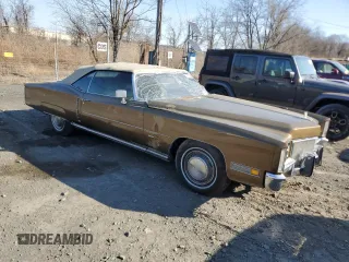 1971 Cadillac Eldorado z VIN 693671Q424620, wystawiony jako Copart lot #48917885 z przebiegiem Nie podano mil oraz Szkoda całkowita • Salvage title. Historia ofert i sprzedaży dostępna na DreamBid. Obrazek 4.