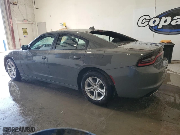 2023 Dodge Charger SXT with VIN 2C3CDXBG2PH587879, listed as a Copart auction lot 54262165 with 60,663 mi miles and Salvage Title. Bid and sale history available at carsss.com. Image 2.