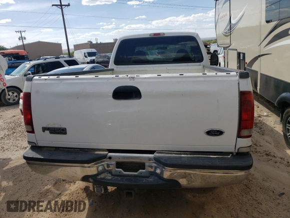 2000 Ford F-250 XL с VIN 1FTNX20F7YEB31717, выставлен на аукционе Copart как лот 55279855 с пробегом 15 921 миль миль и Списание • Salvage title. История ставок и продаж доступна на DreamBid. Изображение 6.
