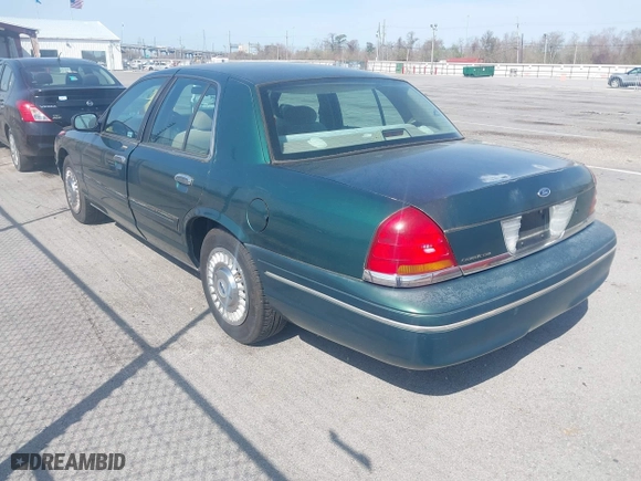 2000 Ford Crown Victoria with VIN 2FAFP73W9YX117108, listed as a IAAI auction lot 41713328 with 83,018 mi miles. Bid and sale history available at carsss.com. Image 3.