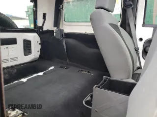 2008 Jeep Wrangler X z VIN 1J4FZ24168L526507, wystawiony jako Copart lot #85711354 z przebiegiem 204 531 mil mil oraz Szkoda całkowita • Salvage title. Historia ofert i sprzedaży dostępna na DreamBid. Obrazek 11.