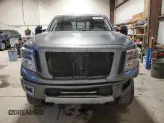 2016 Nissan Titan XD Platinum Reserve with VIN 1N6BA1F44GN503112, listed as a Copart auction lot 81138394 with 143,321 mi miles and Salvage Title. Bid and sale history available at carsss.com. Image 5.