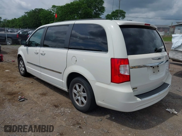 2011 Chrysler Town & Country Touring with VIN 2A4RR5DG9BR775238, listed as a IAAI auction lot 42162442 with 180,408 mi miles and . Bid and sale history available at DreamBid. Image 3.