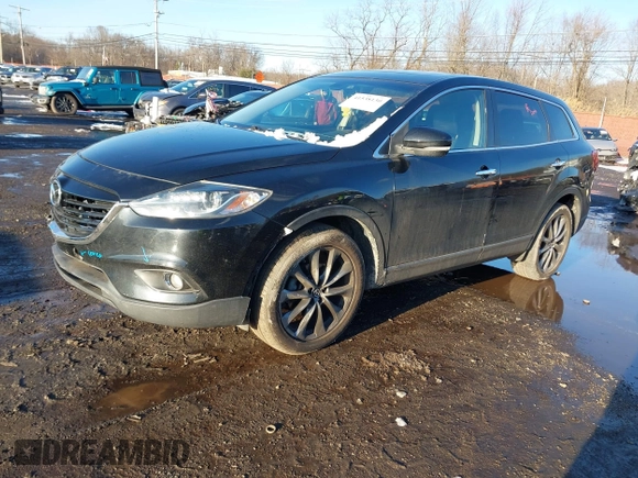 2014 Mazda CX-9 Grand Touring with VIN JM3TB3DV4E0444558, listed as a IAAI auction lot 41538130 with 113,050 mi miles and . Bid and sale history available at DreamBid. Image 2.