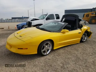 1995 Pontiac Firebird Trans Am z VIN 2G2FV32P6S2225763, wystawiony jako Copart lot #69555203 z przebiegiem 126 643 mil mil oraz Szkody całkowita. Historia ofert i sprzedaży dostępna na DreamBid. Obrazek 1.