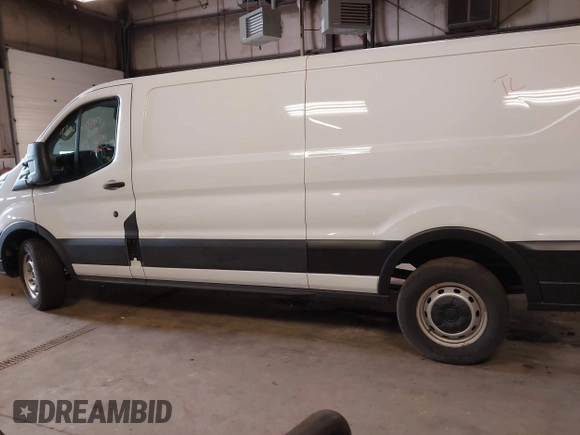 2021 Ford Transit Cargo with VIN 1FTBR1Y87MKA76372, listed as a IAAI auction lot 42251675 with 98,072 mi miles and . Bid and sale history available at DreamBid. Image 14.