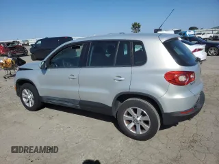 2010 Volkswagen Tiguan S with VIN WVGAV7AX9AW519312, listed as a Copart auction lot 48633055 with 94,740 mi miles and Salvage title. Bid and sale history available at DreamBid. Image 2.