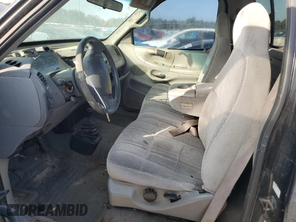 1998 Ford F-150 with VIN 1FTZF18W6WNA50479, listed as a Copart auction lot 42035055 with 125,861 mi miles and Salvage title. Bid and sale history available at DreamBid. Image 7.
