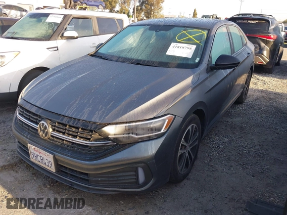 2023 Volkswagen Jetta Sport z VIN 3VWBM7BU5PM035014, wystawiony jako IAAI lot #41818798 z przebiegiem 21 202 mil mil oraz . Historia ofert i sprzedaży dostępna na DreamBid. Obrazek 2.