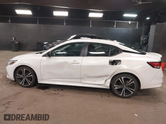 2021 Nissan Sentra SR z VIN 3N1AB8DVXMY320878, wystawiony jako IAAI lot #41911623 z przebiegiem 13 134 mil mil oraz . Historia ofert i sprzedaży dostępna na DreamBid. Obrazek 14.