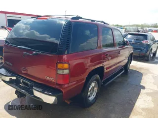 2002 GMC Yukon SLE with VIN 1GKEC13V12R116854, listed as a IAAI auction lot 41799335 with 270,063 mi miles. Bid and sale history available at carsss.com. Image 4.