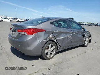2013 Hyundai Elantra GLS z VIN 5NPDH4AE2DH408598, wystawiony jako Copart lot #56076665 z przebiegiem 136 305 mil mil oraz Szkoda całkowita • Salvage title. Historia ofert i sprzedaży dostępna na DreamBid. Obrazek 3.