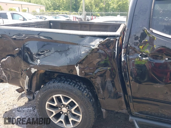 2016 GMC Canyon 4WD SLE z VIN 1GTG6CE35G1171168, wystawiony jako IAAI lot #42275447 z przebiegiem 171 581 mil mil oraz . Historia ofert i sprzedaży dostępna na DreamBid. Obrazek 17.