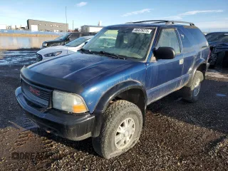 2003 GMC Jimmy z VIN 1GKCT18X13K112296, wystawiony jako Copart lot #46479275 z przebiegiem Nie podano mil oraz Czysty tytuł • Clean title. Historia ofert i sprzedaży dostępna na DreamBid. Obrazek 2.