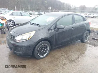 2013 Kia Rio LX with VIN KNADM5A35D6224764, listed as a IAAI auction lot 42004548 with 103,582 mi miles. Bid and sale history available at carsss.com. Image 2.