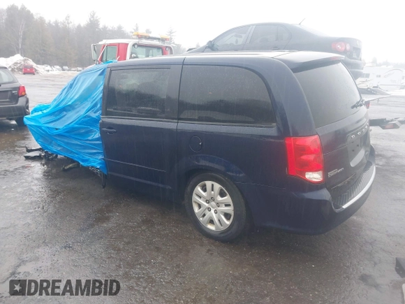 2016 Dodge Grand Caravan SE with VIN 2C4RDGBG3GR258639, listed as a IAAI auction lot 41687082 with 99,616 mi miles and . Bid and sale history available at DreamBid. Image 3.