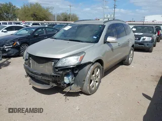 2014 Chevrolet Traverse LTZ z VIN 1GNKRJKDXEJ248849, wystawiony jako IAAI lot #41805119 z przebiegiem 171 489 mil mil oraz . Historia ofert i sprzedaży dostępna na DreamBid. Obrazek 19.