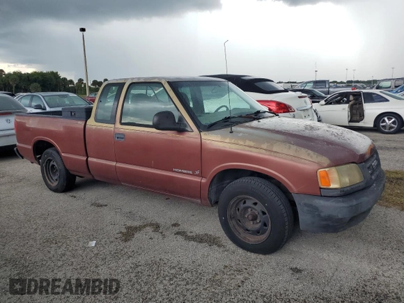 1998 Isuzu Hombre z VIN 1GGCS19X0W8650520, wystawiony jako Copart lot #73962444 z przebiegiem Nie podano mil oraz Szkoda całkowita • Salvage title. Historia ofert i sprzedaży dostępna na DreamBid. Obrazek 4.