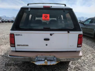 1992 Ford Explorer Eddie Bauer with VIN 1FMDU34X2NUE11927, listed as a Copart auction lot 52094875 with 53,449 mi miles and Salvage title. Bid and sale history available at DreamBid. Image 6.