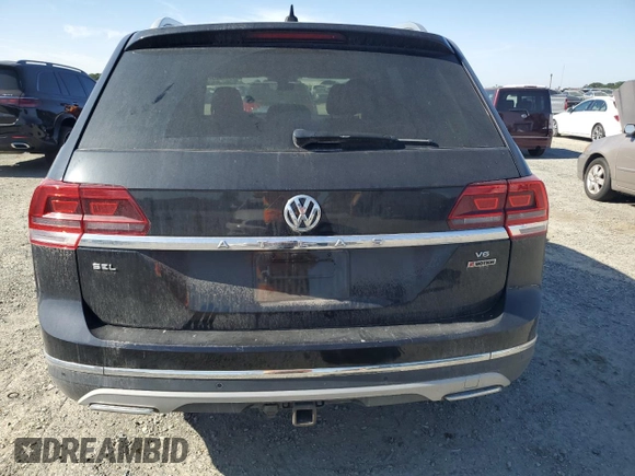 2018 Volkswagen Atlas SEL z VIN 1V2MR2CA5JC556584, wystawiony jako Copart lot #54410255 z przebiegiem 111 580 mil mil oraz Szkoda całkowita • Salvage title. Historia ofert i sprzedaży dostępna na DreamBid. Obrazek 6.