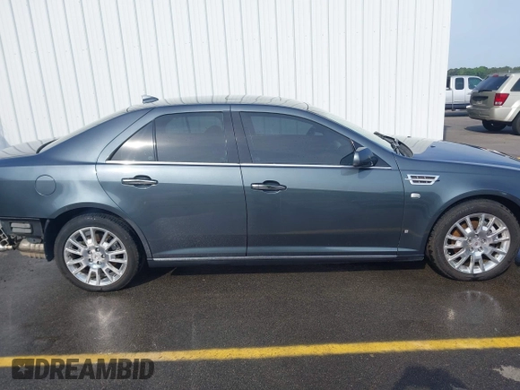 2009 Cadillac STS AWD w/1SB with VIN 1G6DD67V090151883, listed as a IAAI auction lot 42075438 with 97,408 mi miles. Bid and sale history available at carsss.com. Image 14.
