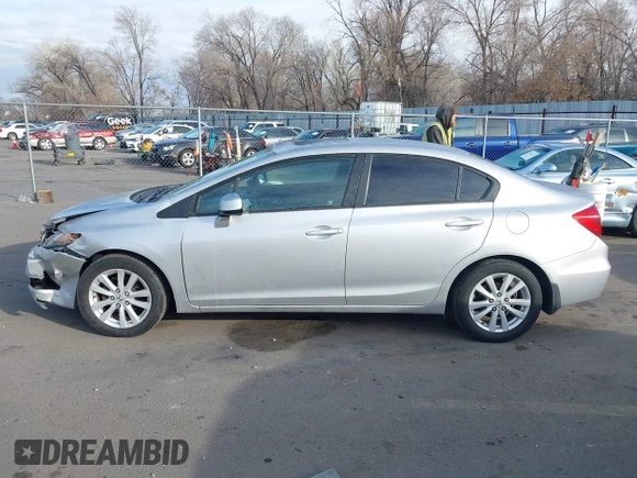 2012 Honda Civic EX with VIN 19XFB2F84CE388245, listed as a IAAI auction lot 41515379 with 228,519 mi miles and . Bid and sale history available at DreamBid. Image 14.