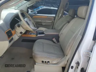 2010 Infiniti QX56 with VIN 5N3ZA0NF3AN904787, listed as a Copart auction lot 55149195 with 227,730 mi miles and Salvage title. Bid and sale history available at DreamBid. Image 7.