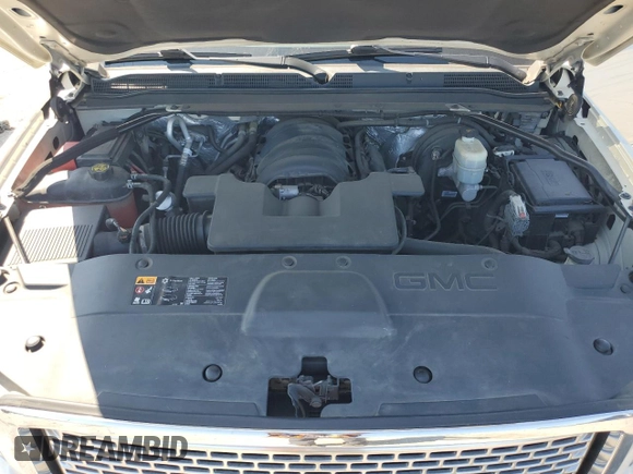 2015 GMC Yukon Denali with VIN 1GKS2CKJ3FR663324, listed as a Copart auction lot 70306614 with 154,234 mi miles and Salvage Title. Bid and sale history available at carsss.com. Image 13.