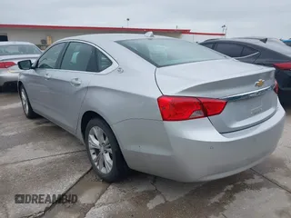 2014 Chevrolet Impala LT with VIN 2G1125S33E9103583, listed as a IAAI auction lot 42125293 with 143,951 mi miles and . Bid and sale history available at DreamBid. Image 3.