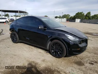 2021 Tesla Model Y Long Range with VIN 5YJYGAEE9MF137910, listed as a Copart auction lot 81921303 with 47,397 mi miles and Salvage Title. Bid and sale history available at DreamBid. Image 4.