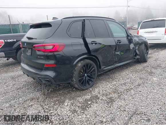 2022 BMW X5 xDrive40i with VIN 5UXCR6C05N9N12775, listed as a IAAI auction lot 42011660 with 92,790 mi miles and . Bid and sale history available at DreamBid. Image 4.