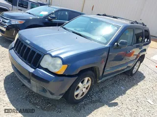 2009 Jeep Grand Cherokee Laredo with VIN 1J8GS48K79C539659, listed as a IAAI auction lot 42063431 with 1 mi miles. Bid and sale history available at carsss.com. Image 2.