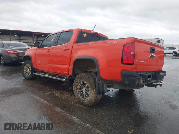 2019 Chevrolet Colorado 4WD ZR2 z VIN 1GCGTEEN1K1160280, wystawiony jako IAAI lot #41166240 z przebiegiem 71 529 mil mil oraz . Historia ofert i sprzedaży dostępna na DreamBid. Obrazek 3.