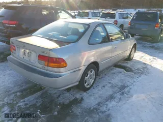 1998 Honda Civic EX with VIN 1HGEJ8242WL114947, listed as a IAAI auction lot 41630431 with 124,702 mi miles. Bid and sale history available at carsss.com. Image 4.