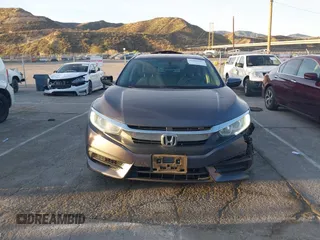 2016 Honda Civic Sedan LX with VIN 2HGFC2F55GH532108, listed as a IAAI auction lot 41860382 with 124,106 mi miles. Bid and sale history available at carsss.com. Image 12.