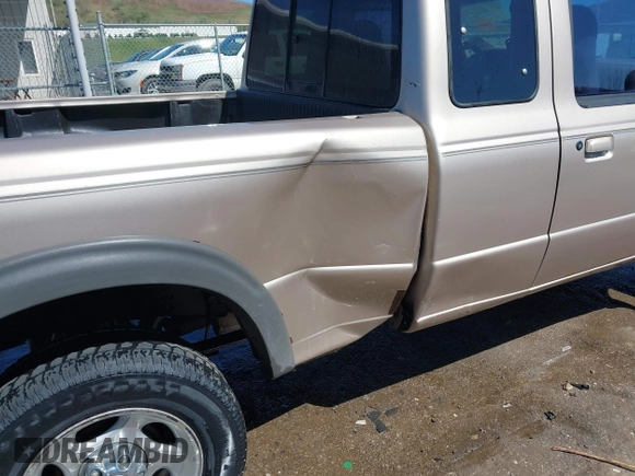 1998 Ford Ranger XL with VIN 1FTZR15X2WTA29628, listed as a IAAI auction lot 41972607 with 149,628 mi miles. Bid and sale history available at carsss.com. Image 6.
