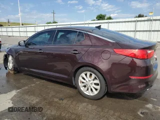 2015 Kia Optima EX with VIN 5XXGN4A79FG409057, listed as a Copart auction lot 62094465 with 123,346 mi miles and Salvage title. Bid and sale history available at DreamBid. Image 2.