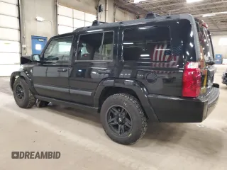 2006 Jeep Commander with VIN 1J8HG48N96C244591, listed as a Copart auction lot 51959975 with 148,342 mi miles and Salvage Title. Bid and sale history available at carsss.com. Image 2.