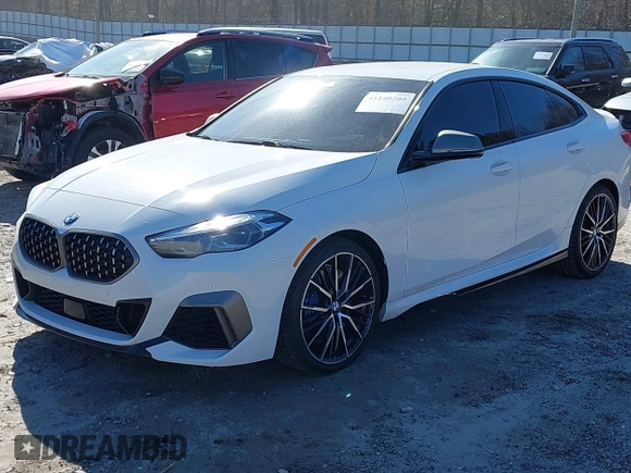 2021 BMW 2 Series M235i xDrive with VIN WBA13AL06M7G61056, listed as a IAAI auction lot 41140205 with 49,413 mi miles and . Bid and sale history available at DreamBid. Image 6.
