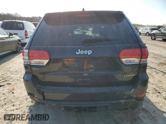 2015 Jeep Grand Cherokee Altitude with VIN 1C4RJEAG4FC653953, listed as a Copart auction lot 48738185 with 117,797 mi miles and Salvage Title. Bid and sale history available at carsss.com. Image 6.