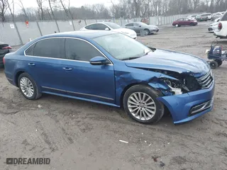 2016 Volkswagen Passat 1.8T SE w/Technology with VIN 1VWBS7A32GC018266, listed as a IAAI auction lot 41425924 with 129,809 mi miles. Bid and sale history available at carsss.com. Image 1.