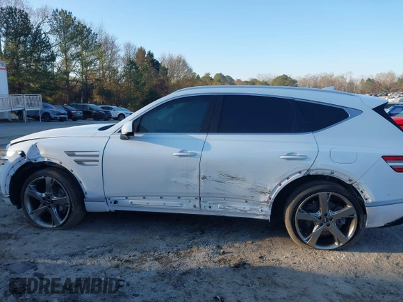 2023 Genesis GV80 z VIN KMUHCESC9PU123083, wystawiony jako IAAI lot #41166075 z przebiegiem 20 216 mil mil oraz . Historia ofert i sprzedaży dostępna na DreamBid. Obrazek 6.