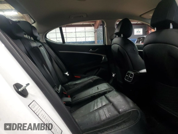 2023 Genesis G70 2.0T with VIN KMTG34TA5PU128224, listed as a Copart auction lot 82026383 with 7,311 mi miles and Salvage Title. Bid and sale history available at DreamBid. Image 10.