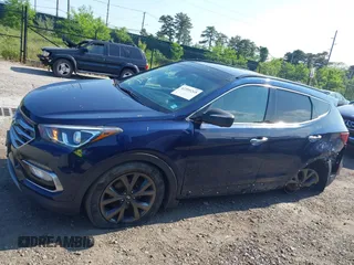 2018 Hyundai Santa Fe Ultimate with VIN 5XYZWDLA3JG571432, listed as a IAAI auction lot 42395245 with 69,330 mi miles and . Bid and sale history available at DreamBid. Image 14.