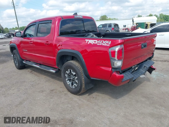 2021 Toyota Tacoma SR z VIN 5TFCZ5AN2MX263159, wystawiony jako IAAI lot #42273087 z przebiegiem 69 220 mil mil oraz . Historia ofert i sprzedaży dostępna na DreamBid. Obrazek 3.