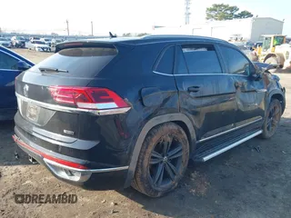 2021 Volkswagen Atlas SE z VIN 1V2RE2CA8MC201494, wystawiony jako IAAI lot #41498075 z przebiegiem 67 687 mil mil oraz . Historia ofert i sprzedaży dostępna na DreamBid. Obrazek 4.