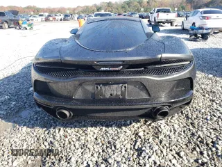 2021 McLaren GT z VIN SBM22GCA8MW001374, wystawiony jako Copart lot #82147064 z przebiegiem 32 562 mil mil oraz Nie do naprawy. Historia ofert i sprzedaży dostępna na DreamBid. Obrazek 6.