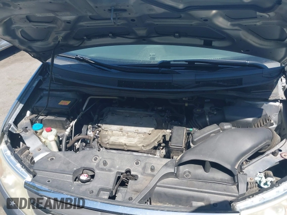 2012 Honda Odyssey EX-L with VIN 5FNRL5H60CB095086, listed as a IAAI auction lot 42251330 with 144,232 mi miles and . Bid and sale history available at DreamBid. Image 10.