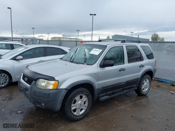 2002 Ford Escape Limited with VIN 1FMCU04152KA38640, listed as a IAAI auction lot 41895674 with 106,449 mi miles. Bid and sale history available at carsss.com. Image 2.